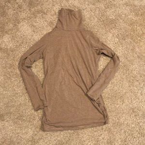 Stripped maternity turtleneck.